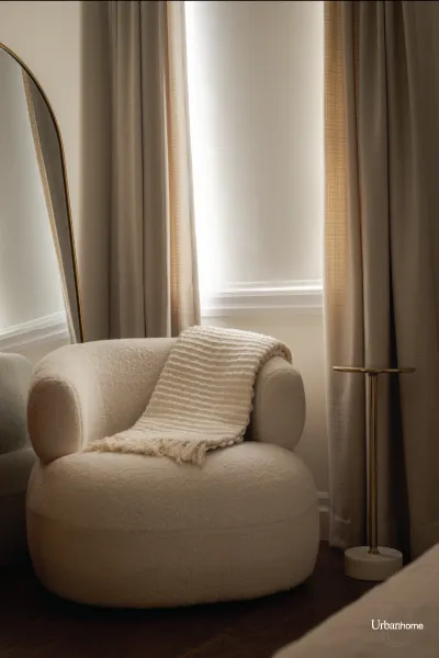 Serene Bedroom Corner with Cream Accent Chair