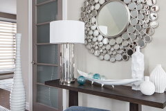 Console table with round mirror diving kitchen and living room