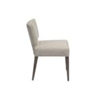 The Aniston Dining Chair featuring a sculpted mid-back silhouette, textured neutral upholstery, and tapered wood legs for a refined yet relaxed look.