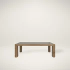 A rustic modern rectangular dining table made of natural wood with thick, block-style legs and a clean-lined silhouette.