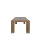 A rustic modern rectangular dining table made of natural wood with thick, block-style legs and a clean-lined silhouette.