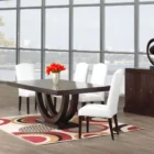 Metro Dining Table featuring a deep espresso finish and a sculptural U-shaped double pedestal base with a rectangular tabletop.