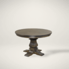 Traditional round dining table in a rich wood tone with a sculpted pedestal base and cross-shaped feet.