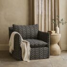 Modern black swivel glider chair with bold chevron upholstery pattern and plush cushion.