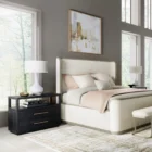 Black two-drawer nightstand with open shelf and textured wood grain.