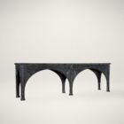 Long black console table with cathedral-inspired arch detailing and a distressed wood finish.