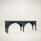Long black console table with cathedral-inspired arch detailing and a distressed wood finish.