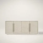 Light wood entertainment console with four panel doors, oversized vertical pulls, and a sleek, minimalist silhouette.