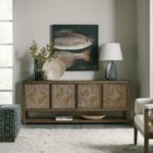 Wooden entertainment console featuring diamond-patterned door fronts crafted from natural rattan in a rustic finish.