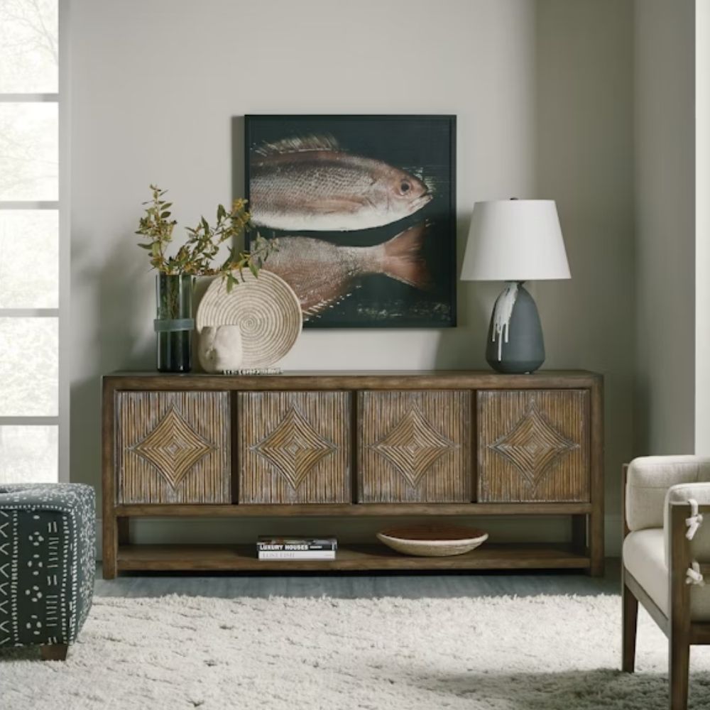 Wooden entertainment console featuring diamond-patterned door fronts crafted from natural rattan in a rustic finish.