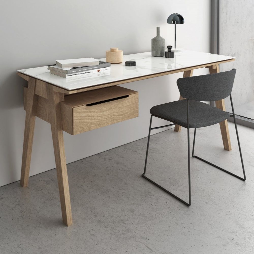 Minimalist birch wood desk with cream top and integrated drawer unit on the left side.