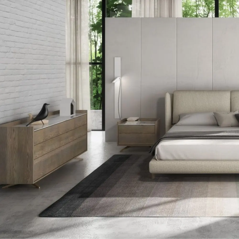 Modern wood dresser with three wide drawers and a white marble top.