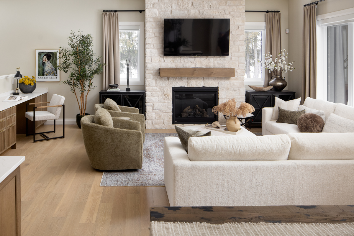 Stone fireplace living room with faux olive tree
