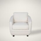 Modern white club chair with plush cushions, curved arms, and dark wooden legs.