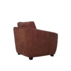 Modern club chair with plush cushions, curved arms, and dark wooden legs.
