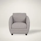 Modern club chair with plush cushions, curved arms, and dark wooden legs.