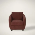Modern club chair with plush cushions, curved arms, and dark wooden legs.