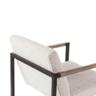 The LH Imports Breve Dining Chair features a softly curved upholstered seat in a neutral tone, supported by warm wood legs with a mid-century silhouette.
