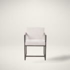 The LH Imports Breve Dining Chair features a softly curved upholstered seat in a neutral tone, supported by warm wood legs with a mid-century silhouette.