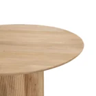 Round natural wood dining table with a fluted cylindrical pedestal base and smooth tabletop.
