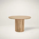 Round natural wood dining table with a fluted cylindrical pedestal base and smooth tabletop.