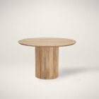 Round natural wood dining table with a fluted cylindrical pedestal base and smooth tabletop.