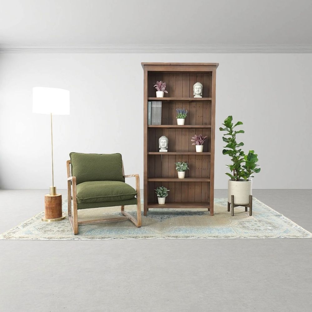 Mid-century inspired club chair with weathered wood frame and deep green cushions