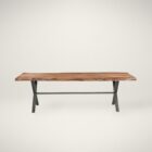 Rectangular live-edge wood dining table with a natural finish and matte black metal cross-frame legs.