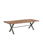 Rectangular live-edge wood dining table with a natural finish and matte black metal cross-frame legs.