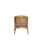 Contemporary accent chair with light boucle cushions and natural wood frame featuring open cane sides.