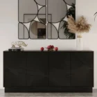 Black wooden sideboard with dramatic concentric carved patterns across its double-door front.