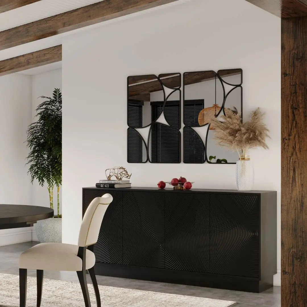 Black wooden sideboard with dramatic concentric carved patterns across its double-door front.