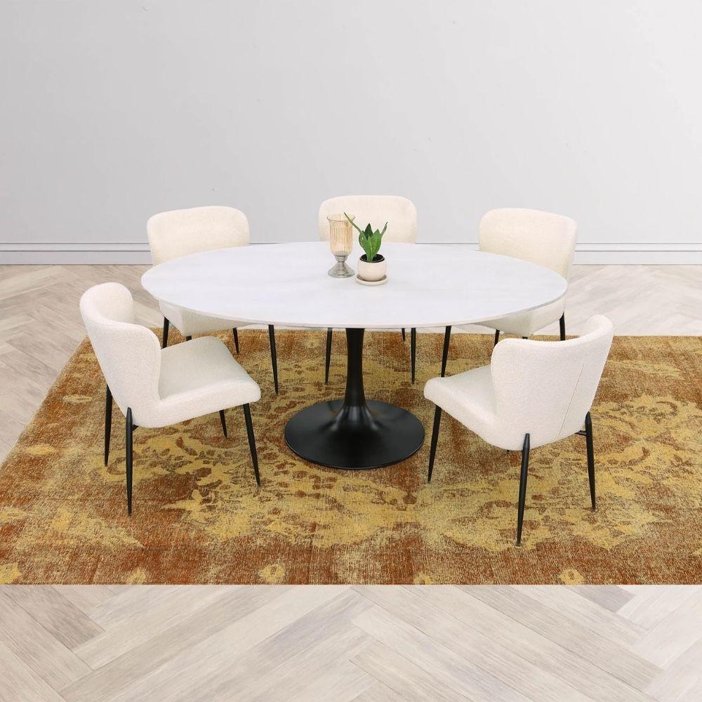revi Dining Chair featuring soft cream boucle-style fabric with slim black metal legs.