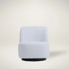 Minimalist white boucle swivel chair with soft curves and black base.