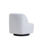 Minimalist white boucle swivel chair with soft curves and black base.