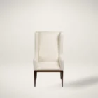 A high-back, upholstered dining chair with wingback arms, straight profile, and a dark wood leg frame.