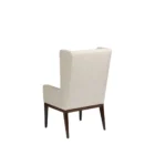 A high-back, upholstered dining chair with wingback arms, straight profile, and a dark wood leg frame.