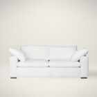 Plush white two-seat sofa with deep cushions, oversized arms, and a minimalist silhouette.