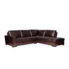Rich brown leather three-seat sofa with wide arms, low profile, and deep plush cushions.
