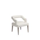 Elegant modern dining armchair with sculpted backrest and plush ivory upholstery, shown in both a lifestyle interior and isolated product view.