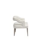Elegant modern dining armchair with sculpted backrest and plush ivory upholstery, shown in both a lifestyle interior and isolated product view.