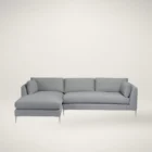 Modern grey sectional sofa with low back, slim arms, and metal tapered legs featuring a left-facing chaise