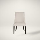Rosen Dining Chair, featuring a high back, softly curved silhouette, and dark tapered legs with a smooth, ivory-toned upholstered seat.