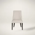 Rosen Dining Chair, featuring a high back, softly curved silhouette, and dark tapered legs with a smooth, ivory-toned upholstered seat.