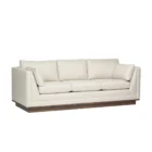 Contemporary cream-colored sofa with structured arms, three back cushions, and a recessed wood base.
