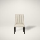 rinity Dining Chair, featuring a vertically channeled backrest, smooth cream upholstery, and tapered dark wood legs.