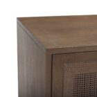 Medium brown wooden sideboard with four panel doors featuring woven cane fronts and a sleek base frame.