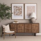 Medium brown wooden sideboard with four panel doors featuring woven cane fronts and a sleek base frame.