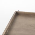 Rectangular two-tier wood coffee table with raised tray edges and a slim black metal frame.
