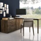 L-shaped modern desk in charcoal wood finish with a floating black surface and integrated storage drawers.